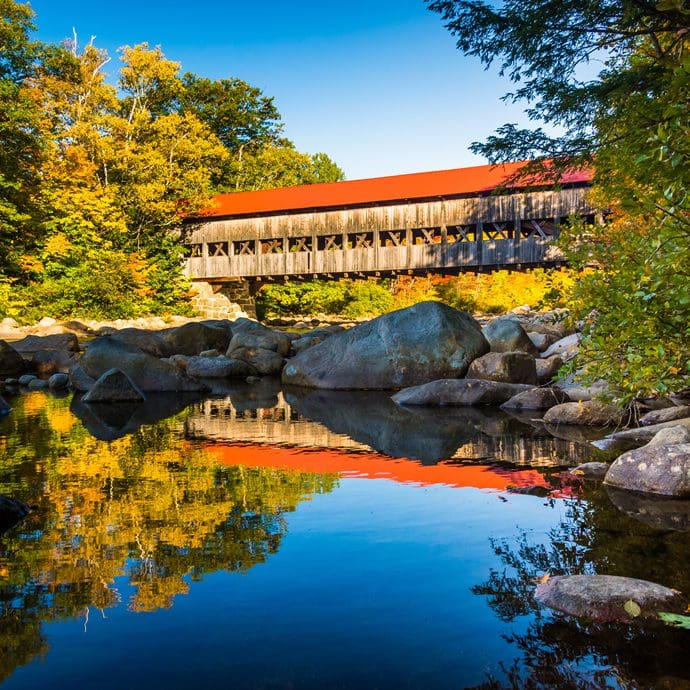 Covered bridge along the Kancamagus Highway in New Hampshire's White Mountains Covered bridge along the Kancamagus Highway in New Hampshire's White Mountains