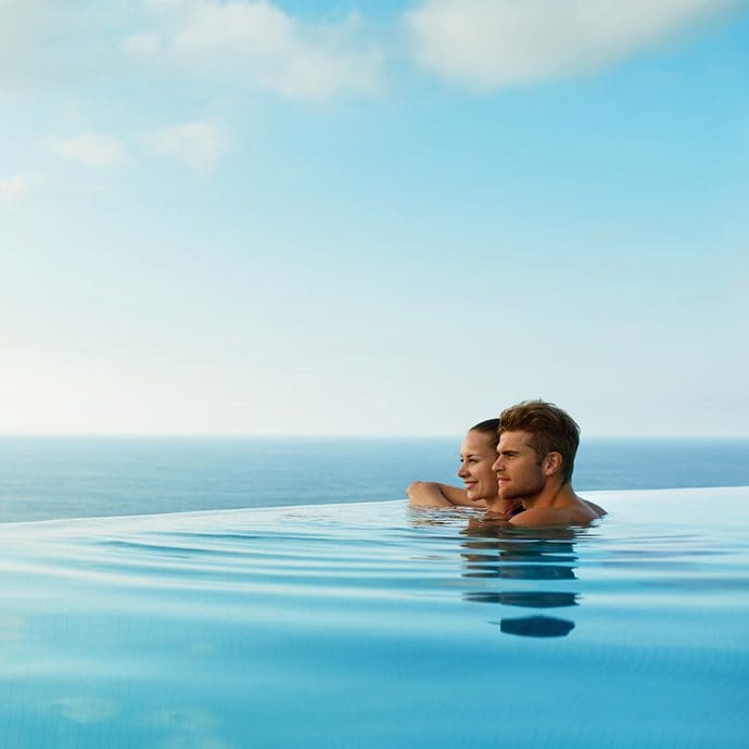 Couple, infinity pool