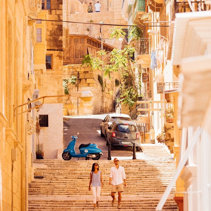 Couple exploring the streets of Valletta - Visit Malta
