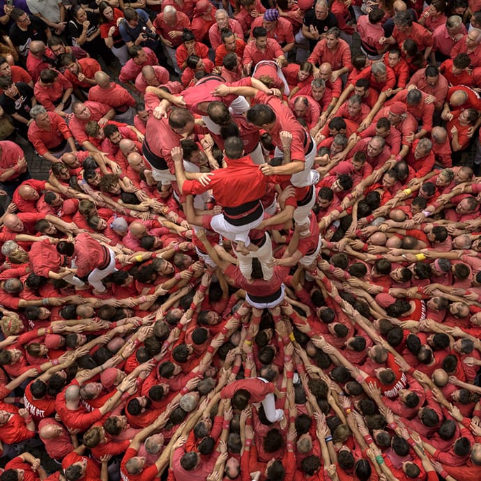Human tower, Santa Úrsula Festival in Plaça del Blat square, Valls - Catalan Tourist Board/Sergi Boixader
