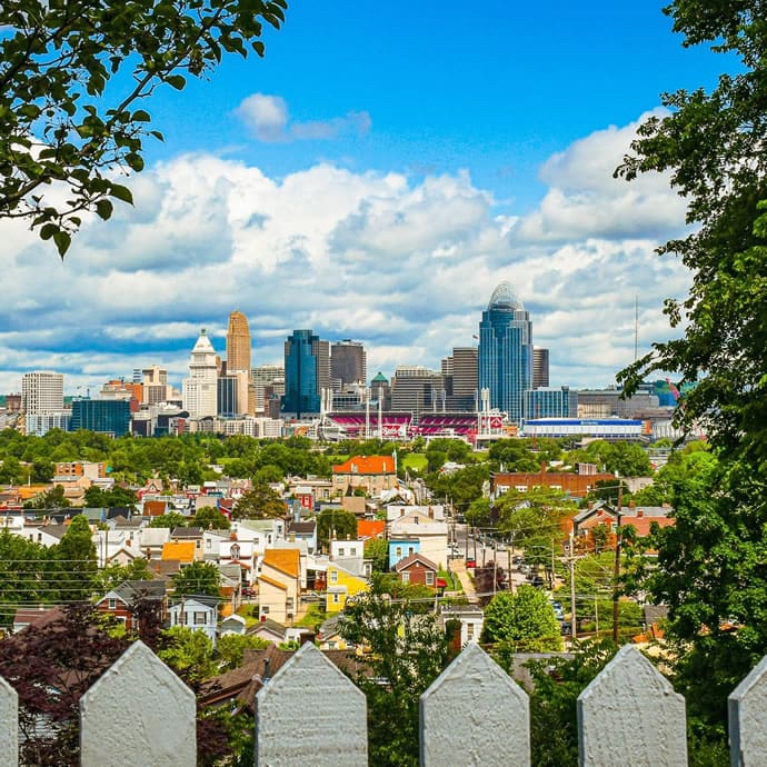 The Cincinnati Skyline viewed from a hillside in Newport, Kentucky, looking across the Ohio River – Visit Cincy