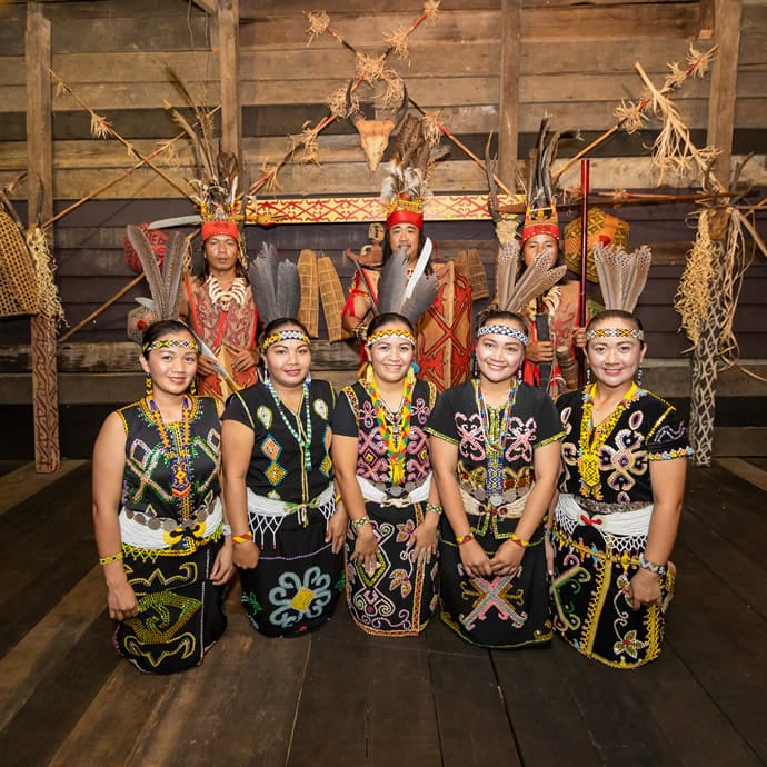 Show performers wearing traditional indigenous attire at the Mari Mari Cultural Village near Kota Kinabalu in Sabah, Malaysia - Sabah Tourism